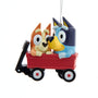 Bluey and Bingo wagon ornament featuring the two characters riding together in a red pull wagon with a hanging cord.