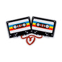 Cassette tape couple ornament with two retro tapes, colorful stripes, and a red ribbon detail shaped like a heart.