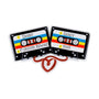 Personalized cassette couple ornament with names on the tape labels, a short phrase on one cassette, and space for a year on the other.
