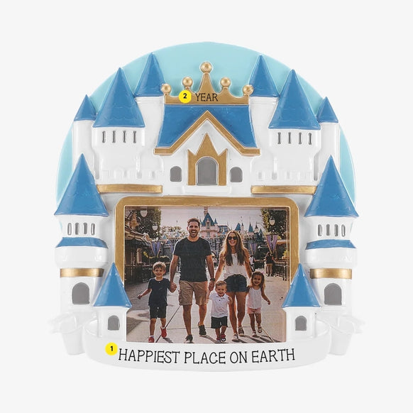 Personalized castle photo frame ornament with an example of “Happiest Place on Earth” written along the bottom and a year added near the gold crown.