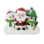 Christmas character family ornament for three with a snowman, Santa, and penguin standing together on snow.