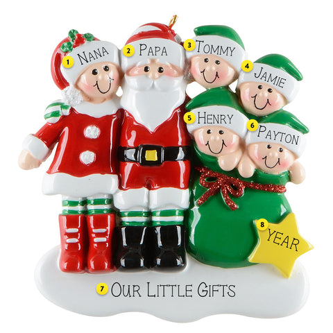 Personalized Christmas ornament with Santa and family members on a white background