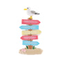Coastal sign ornament with a seagull perched on top, colorful directional signs, and a sandy beach base with a starfish.