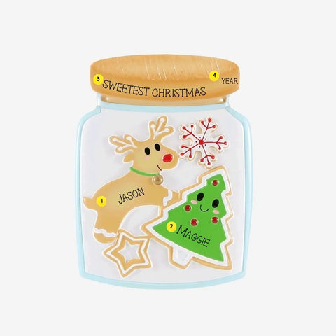 Personalized cookie jar couple ornament with names on the reindeer and tree cookies, plus phrase and year on the jar lid.