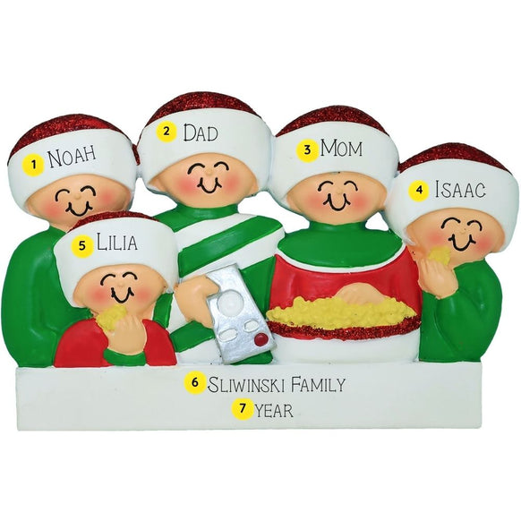 Personalized family Christmas movie night ornament with names and years on a white background