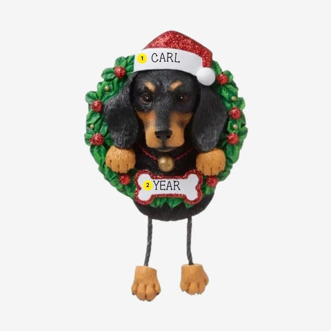 Personalized Dachshund ornament example with name on Santa hat and year on bone-shaped plaque