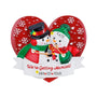 Personalized engagement snowman couple ornament with names on the hats, wedding date on the base, and “We’re Getting Married!” on the banner.