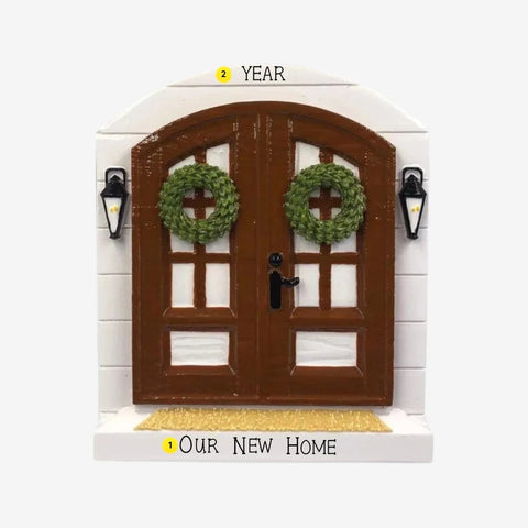 Farmhouse door ornament personalizing example with “Our New Home” on the front step and year above the doors