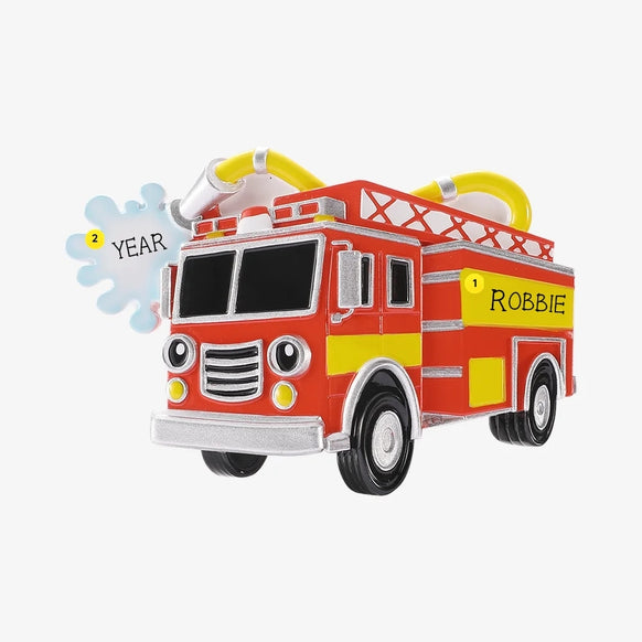 Personalized red and yellow firetruck ornament with headlight eyes, ladder, hose, name on the side panel, and year on the water splash.