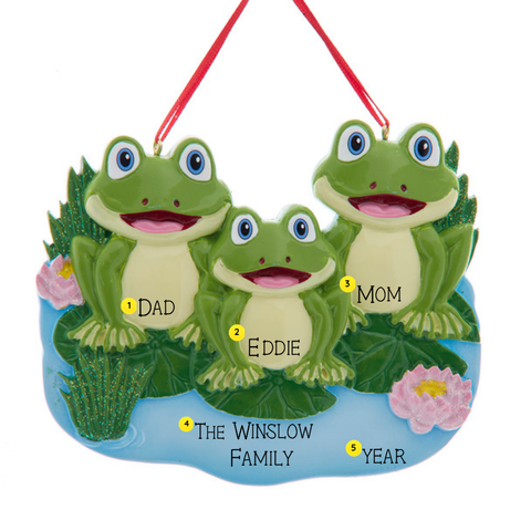 Personalized frog pond family of three ornament showing individual names, family wording, and the year