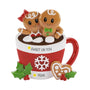 Personalized gingerbread couple in hot cocoa mug ornament with an example phrase and year placement shown.