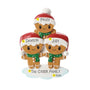 Personalized gingerbread family of three ornament with names on the Santa hat brims, a family name or phrase on the snowy base, and the year added near the bottom.