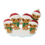 Gingerbread family of five ornament with five smiling gingerbread people in Santa hats and green scarves, arranged on a snowy base.