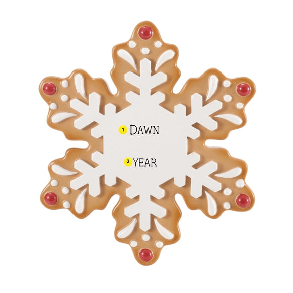 Personalized gingerbread snowflake ornament with a name and year in the white center.