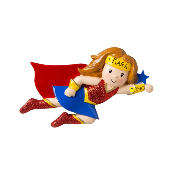 Personalized girl superhero ornament flying in a red cape with name on her yellow headband and year on her wrist.