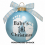 Front of blue Baby’s First Christmas ornament with white footprints and Baby’s 1st Christmas design
