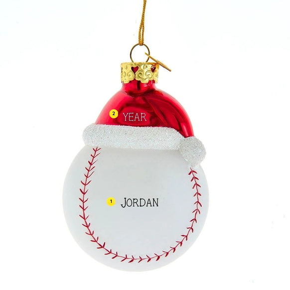 Personalized glass baseball ornament with red Santa hat, white glitter trim, red stitching, and name and year personalization guide.