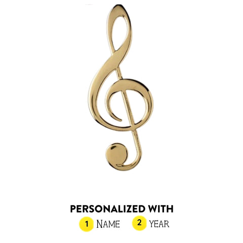 Personalized gold treble clef ornament shown with name and year option graphic
