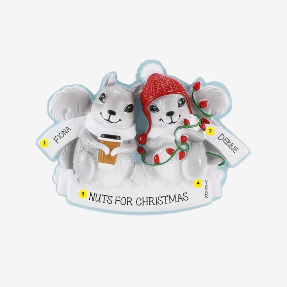 Personalized grey squirrel couple ornament with names on the scarves, “Nuts for Christmas” on the snowy base, and year.