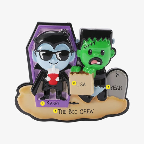 Personalized Mockup:
Personalized Halloween monster family of 2 ornament with a vampire in a purple coffin and Frankenstein by a gravestone, custom names, “The Boo Crew,” and year.