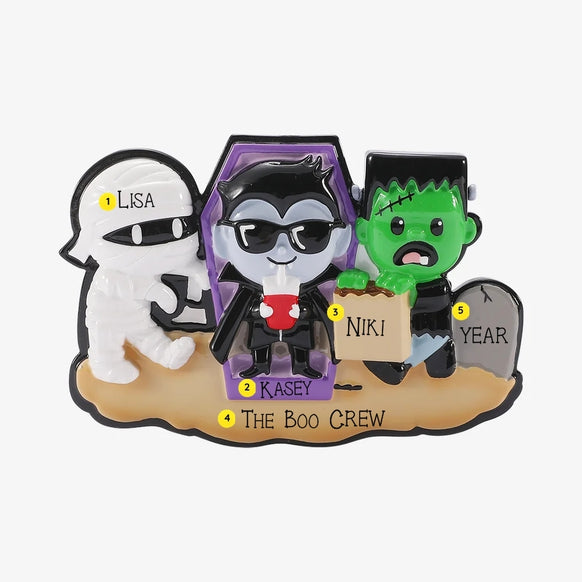 Personalized Mockup:
Personalized Halloween monster family of 3 ornament with a mummy, vampire, and Frankenstein, custom names, “The Boo Crew,” and year.