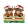 Personalized Highland cow couple ornament with names on the Santa hats, a cute holiday phrase on the fence, and year below.