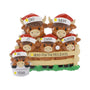 Personalized Highland cow family ornament with names on the Santa hats, a holiday phrase on the fence, and year on one bucket.