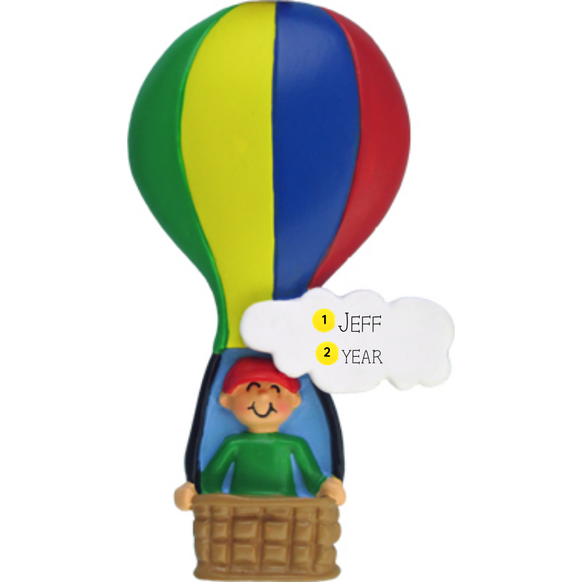 Colorful hot air balloon ornament with a child figure in a basket on a white background personalized with name and year. 