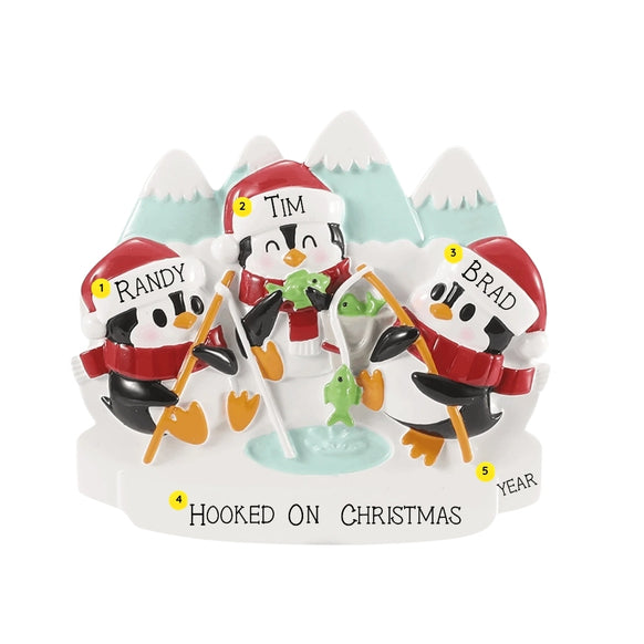 Personalized ice fishing penguin family ornament for three with example names on the hats, a short family phrase across the snow, and a year.