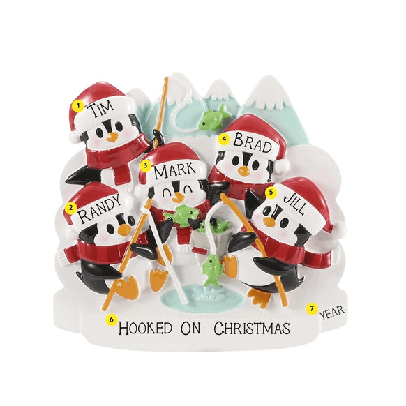 Personalized ice fishing penguin family ornament for five with example names on the hats, a short family phrase across the snow, and a year.