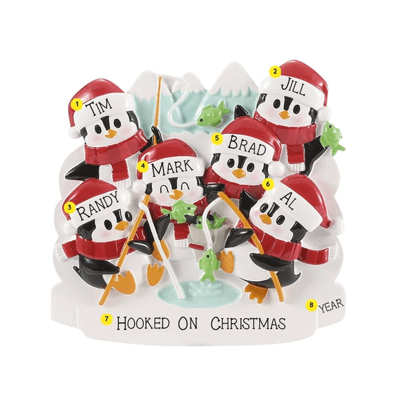 Personalized ice fishing penguin family ornament for six with example names on the hats, a short family phrase across the snow, and a year.