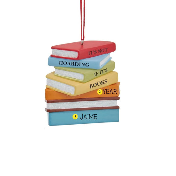 Personalized stack of books ornament with the phrase “It’s Not Hoarding If It’s Books” and space for a name and year.