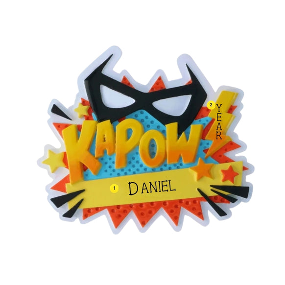 Ka-Pow superhero ornament personalizing example with name on yellow banner and year on lightning bolt