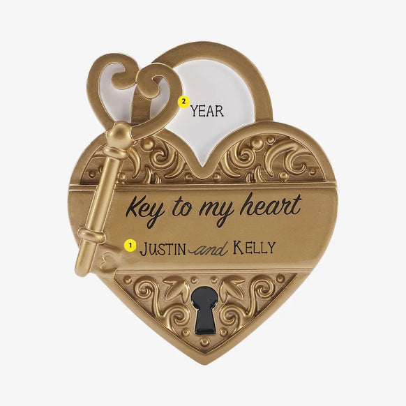 Personalized key to my heart gold lock ornament with couple’s names below the printed message and year placement above the lock.