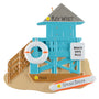 Decorative ornament of a beach lifeguard tower with 'Beach Days Rule' text, featuring a life buoy and surfboard.