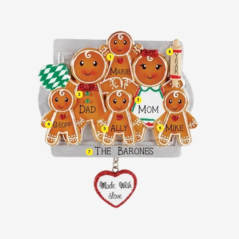 Personalized Made With Love family of 6 ornament with gingerbread cookie family, names, year, family name, baking tray, oven mitt, rolling pin, and dangling heart charm.