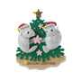 Personalized manatee couple ornament with example names on Santa hats, a short holiday phrase across the sand, and a year.