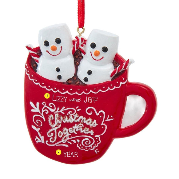 Personalized marshmallow snowman couple mug ornament showing two names on the red mug and year placement near the bottom.