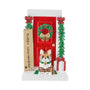 Personalized Meowy Christmas door ornament with a cat sitting in front of a decorated red Christmas door.