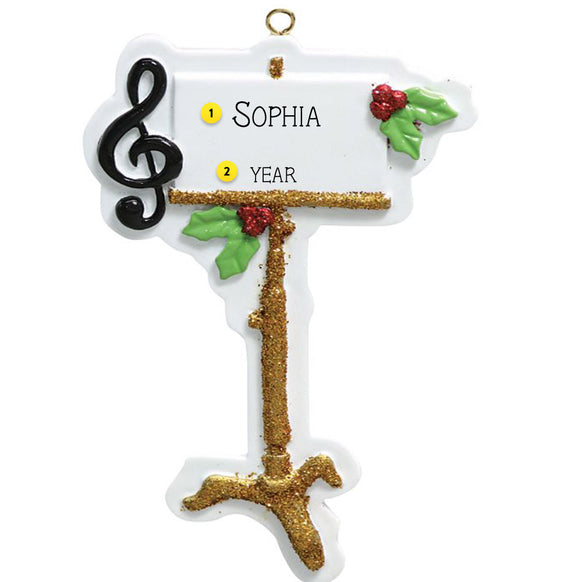 Decorative music stand ornament with musical notes and text on a white background 