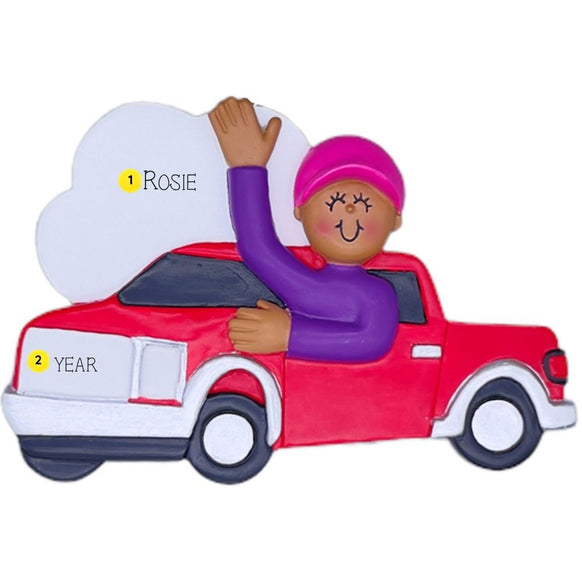 Decorative ornament of a person in a red truck with a cloud in the background. Personalized with name and year. 