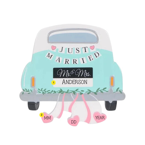 Personalized newlywed getaway car ornament with a last name on the license plate and wedding date numbers added to the hanging hearts.