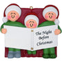 Decorative ornament with three characters holding a book titled 'The Night Before Christmas'.