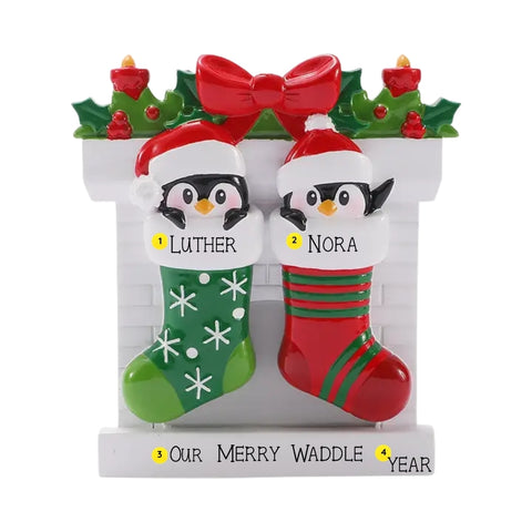 Personalized penguin stocking couple ornament with names, phrase, and year placement shown.