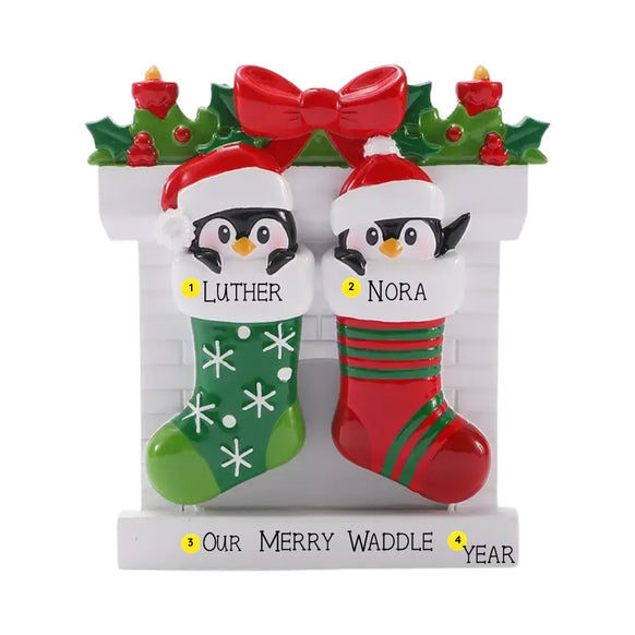 Personalized penguin stocking couple ornament with names, phrase, and year placement shown.