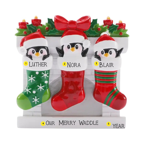 Personalized penguin stocking family of three ornament with names, phrase, and year placement shown.