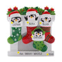 Personalized penguin stocking family of four ornament with names, phrase, and year placement shown.