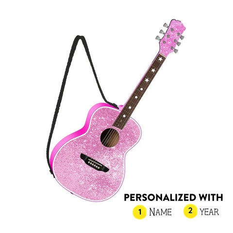 Personalized pink sparkle acoustic guitar ornament with black strap, star accents on the neck, and options for a name and year.