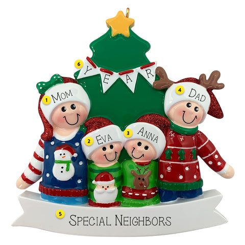 Personalized Christmas ornament with a family of fOUR in front of a Christmas tree, with space for personalizing