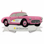 Pink vintage car ornament on a white background